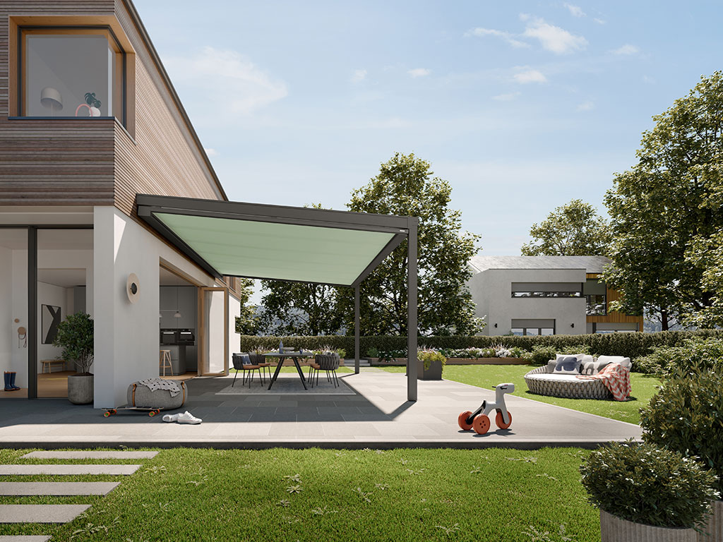 Gartenterrasse mit grüner Pergola